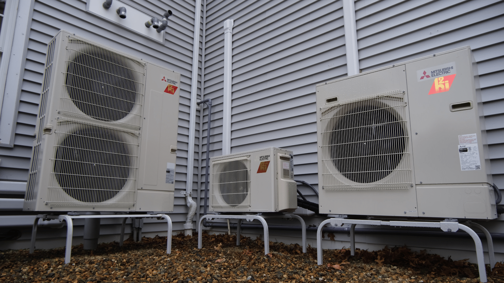 three outdoor heat pump units